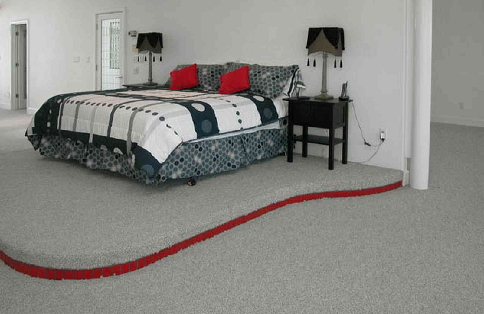 Navarre:-7332-Grand-Navarre-Blvd_54.jpg:  master bedroom, art deco house, black lacquer bedstands