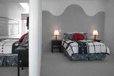 Navarre:-7332-Grand-Navarre-Blvd_55.jpg:  art deco house, master bedroom, glass wall, 3rd floor, art deco decor