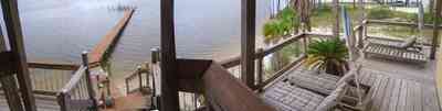Navarre:-Biscayne-Pointe-Drive-House_21.jpg:  santa rosa sound, deck pier, dock, boat slip, palm tree