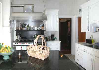 North-Hill:-105-West-Gonzales-Street_41.jpg:  basket, granite countertop, commercial range, tile floor