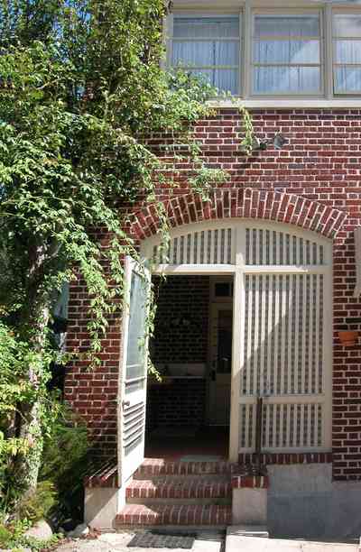 North-Hill:-105-West-Gonzales-Street_51.jpg:  mud room, red brick house, north hill preservation district