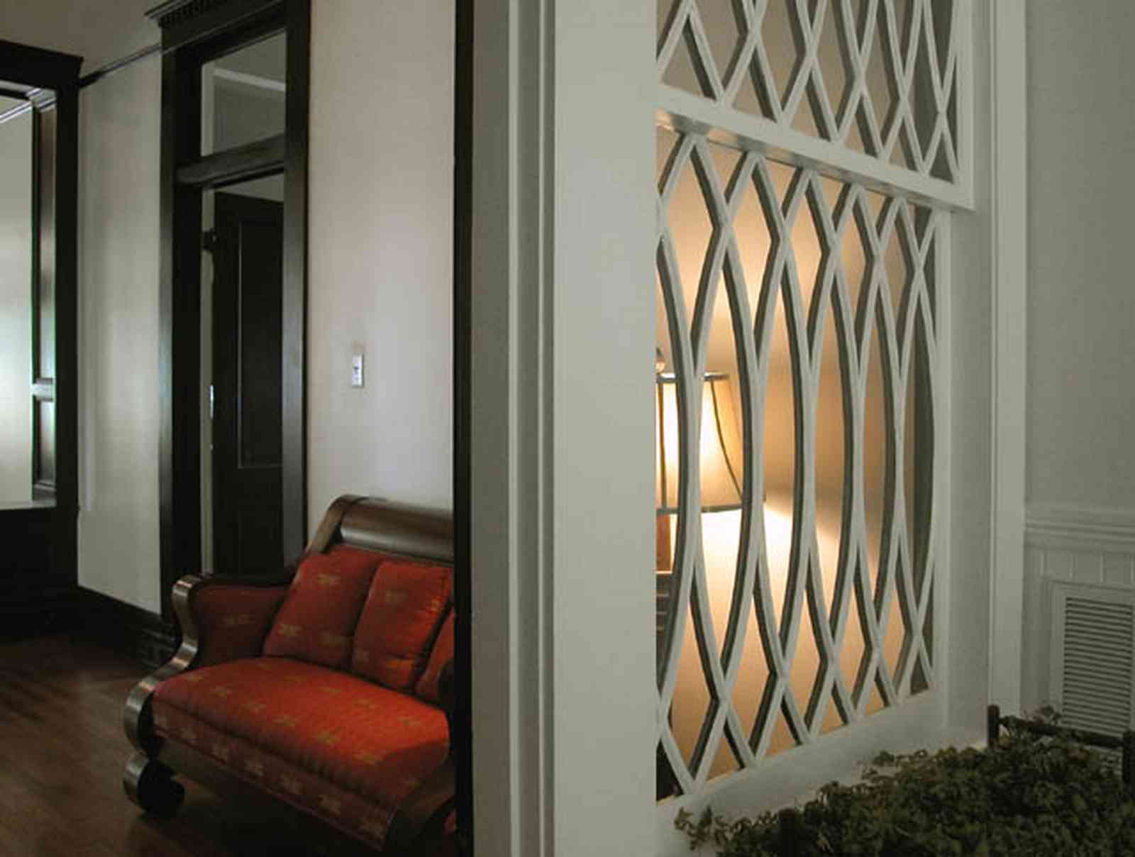 North-Hill:-116-DeSoto-St_02e.jpg:  central hall, red brocade sofa, heartpine floors, transom