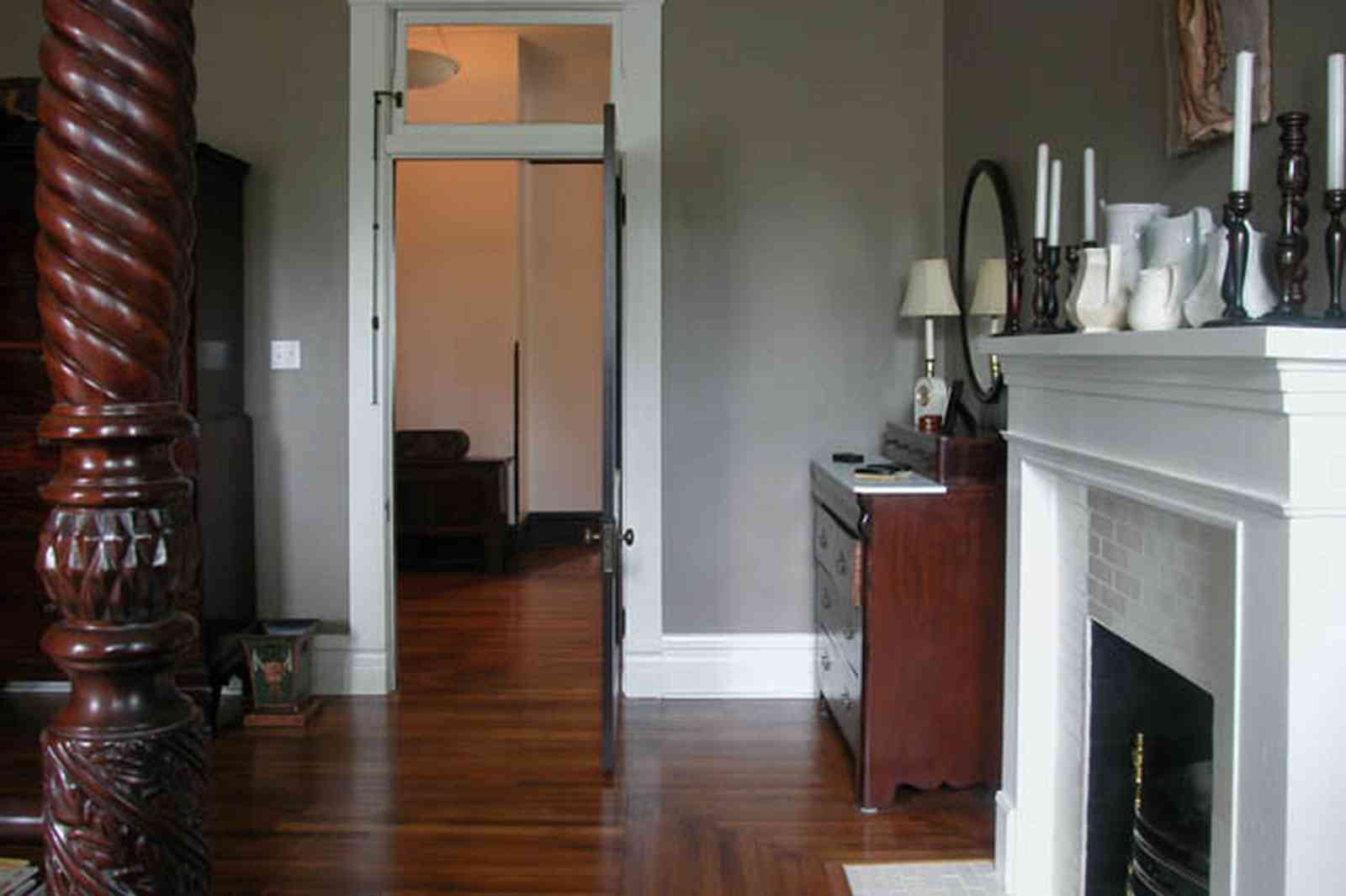 North-Hill:-116-DeSoto-St_02s.jpg:  mantle, fireplace, heartpine floors, dresser, hall, transom