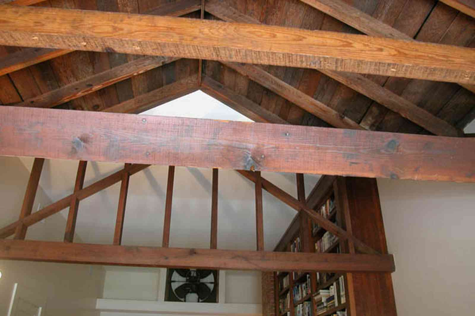 North-Hill:-116-DeSoto-St_02v.jpg:  ceiling beans, second floor, converted attic, bookcases, library, attic fan