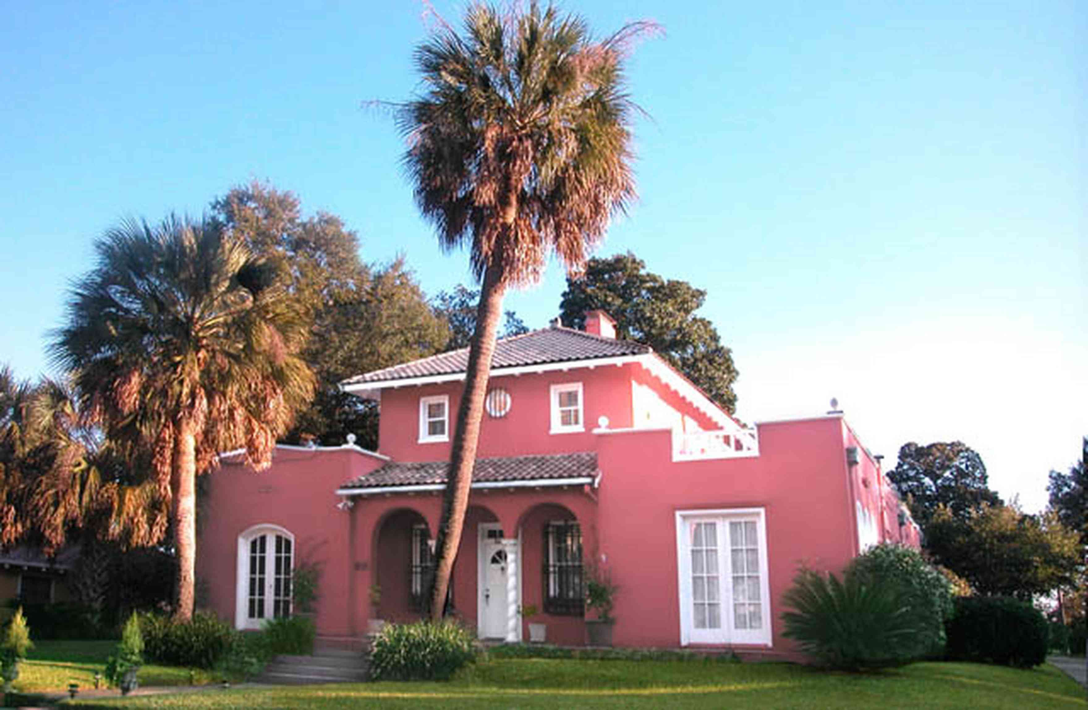 North-Hill:-123-West-Lloyd-Street_01.jpg:  spanish revival architecture, palm tree, french doors, columns