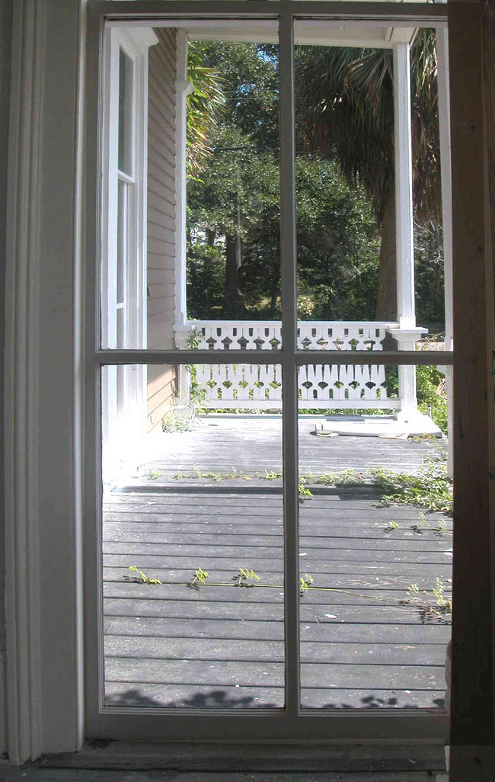 North-Hill:-200-West-Jackson-Street_12.jpg:  front porch, floor length windows, gingerbread trim, balloon frame construction, victorian house