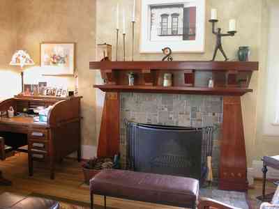 North-Hill:-284-West-Gonzales-Street_15.jpg:  heartpine floors, stone mantle, craftsman cottage, roll-top desk