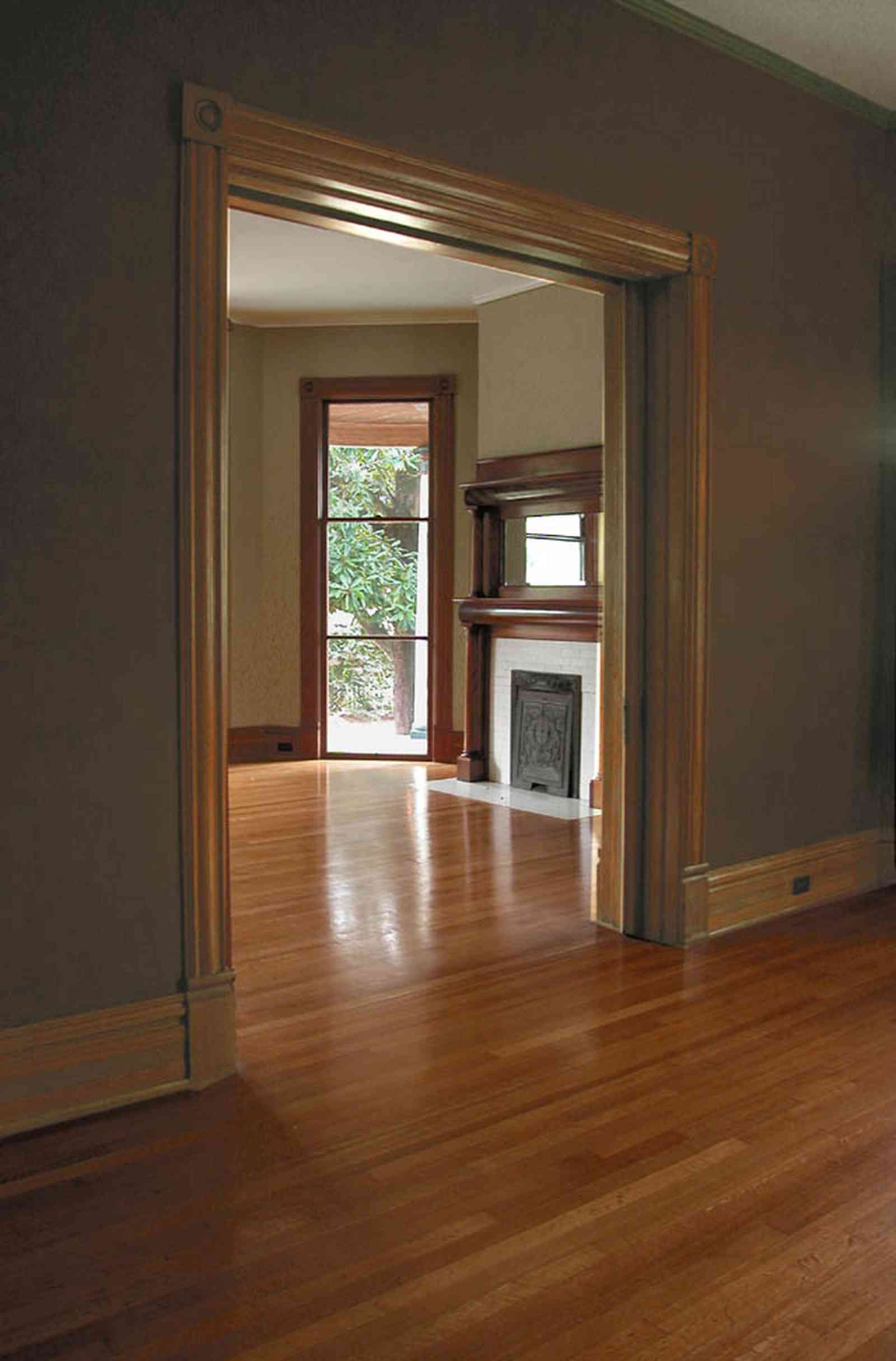 North-Hill:-304-West-Gadsden-Street_17.jpg:  heartpine floors, mantle, fireplace, floor lenght windows