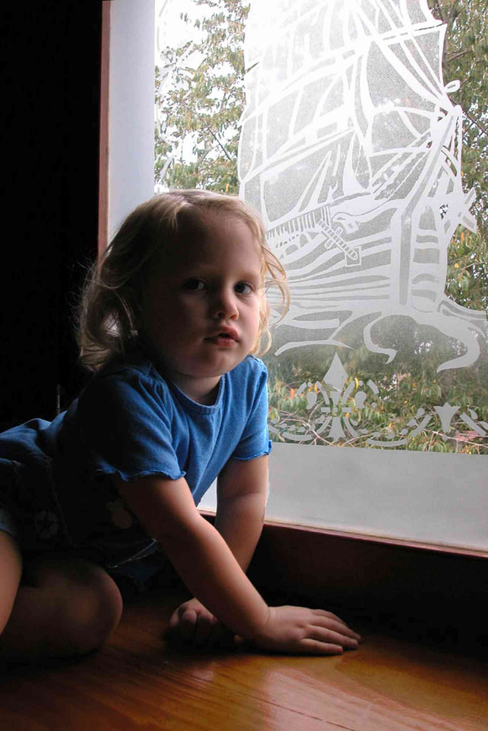 North-Hill:-52-West-Gonzalez-Street_31.jpg:  stained glass window, window seat, evelyn odom, childrens attic playroom