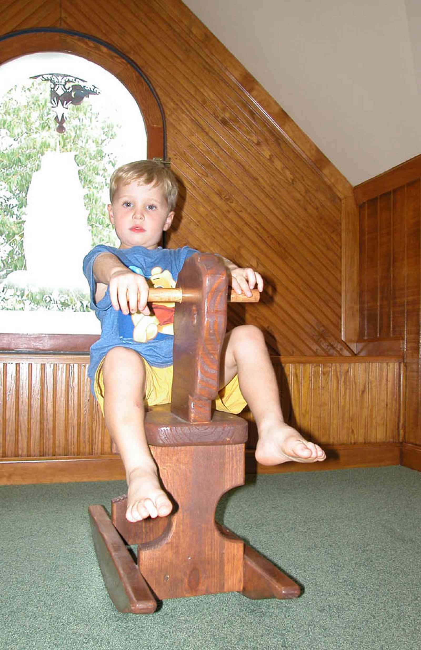 North-Hill:-52-West-Gonzalez-Street_34.jpg:  rocking horse, attic, childrens play room, attic, stained glass window