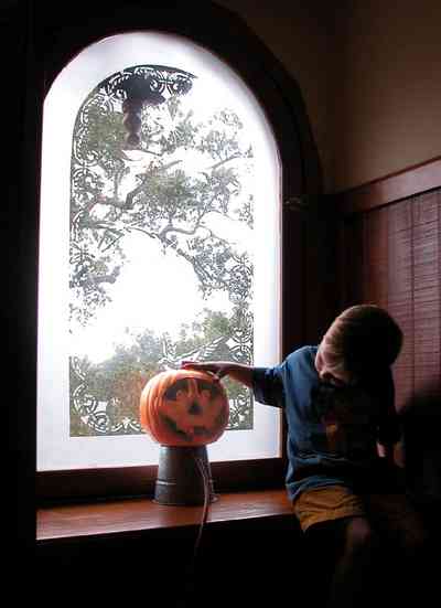 North-Hill:-52-West-Gonzalez-Street_36.jpg:  halloween pumpkin, stained glass window, attic, window seat