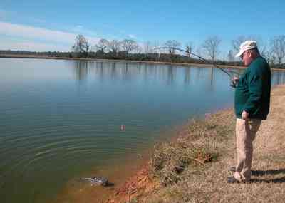 Oak-Grove:-Carpenters-Catfish-Farm_03.jpg:  catfish, hook, fisherman, catfish farm, lake, pond, rod and reel