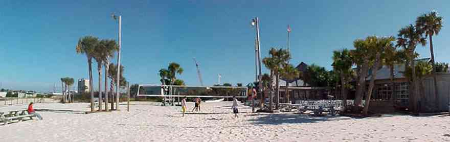 Pensacola-Beach:-Flounders-Restaurant_01.jpg:  volleyball, palm trees, quietwater beach, sand