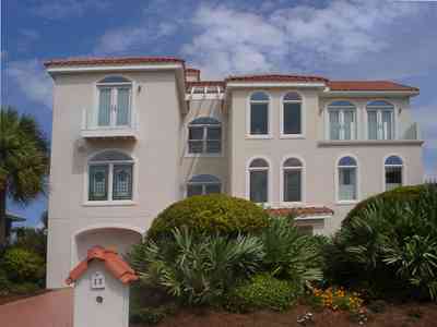 Pensacola-Beach:-Sugar-Bowl-Subdivision_05.jpg:  italienate villa, palm tree, santa rosa sound, sugar bowl subdivision