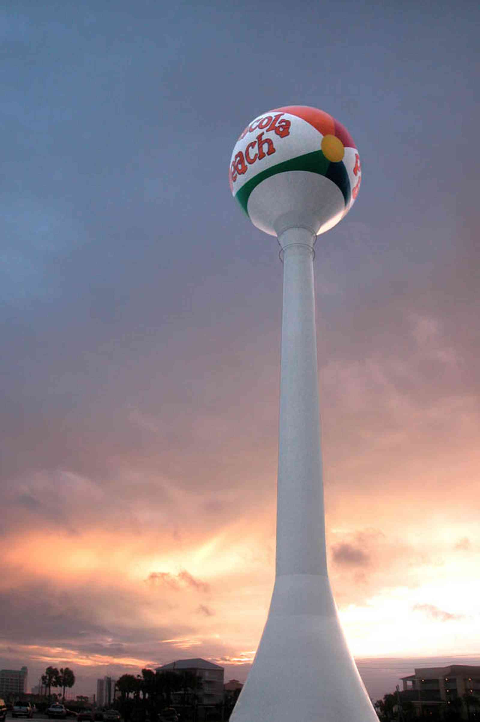 Pensacola-Beach:-Sunset_00.jpg:  water tower, sunset, palm tree, beach ball, mixed skies