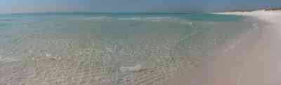 Pensacola-Beach:-Waterfront_09.jpg:  seashore, wave, quartz sand crystal, emerald coast, shallow water