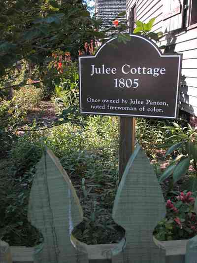 Pensacola:-Historic-Pensacola-Village:-Julee-Cottage_00.jpg:  historic village, slave cottage, wood shingle roof, soldiers, reenactors, oak tree