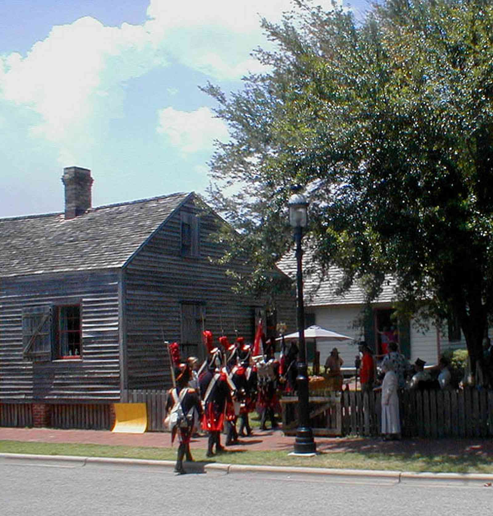 Pensacola:-Historic-Pensacola-Village:-Julee-Cottage_000.jpg:  picket fence, historical reenactment, village, oak tree