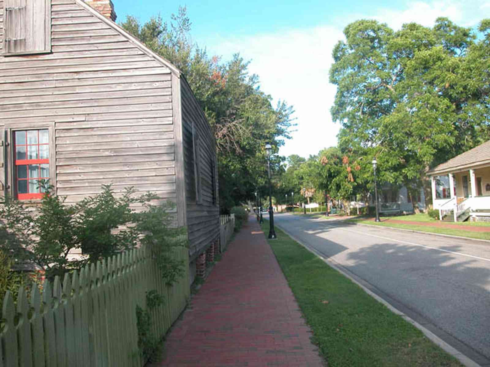 Pensacola:-Historic-Pensacola-Village:-Julee-Cottage_00c.jpg Pensacola:-Historic-Pensacola-Village:-Julee-Cottage_00c.jpg: brick sidewalk, wood shingle roof, shutters, picket fence, freewoman of color, musuem