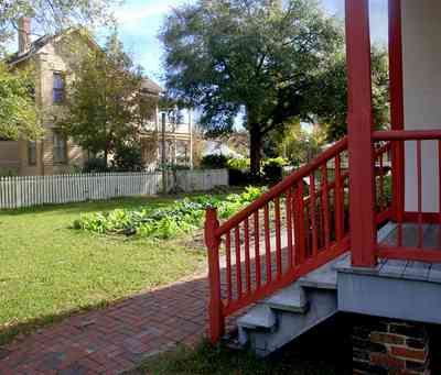 Pensacola:-Historic-Pensacola-Village:-LaValle-House_03.jpg:  kitchen garden, greens, turnips, lettuce, porch, picket fence