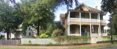 Pensacola:-Historic-Pensacola-Village:-Lear-Rocheblave-House_02.jpg:  victorian house, victorian front porch, white picket fence, historic village, oak tree