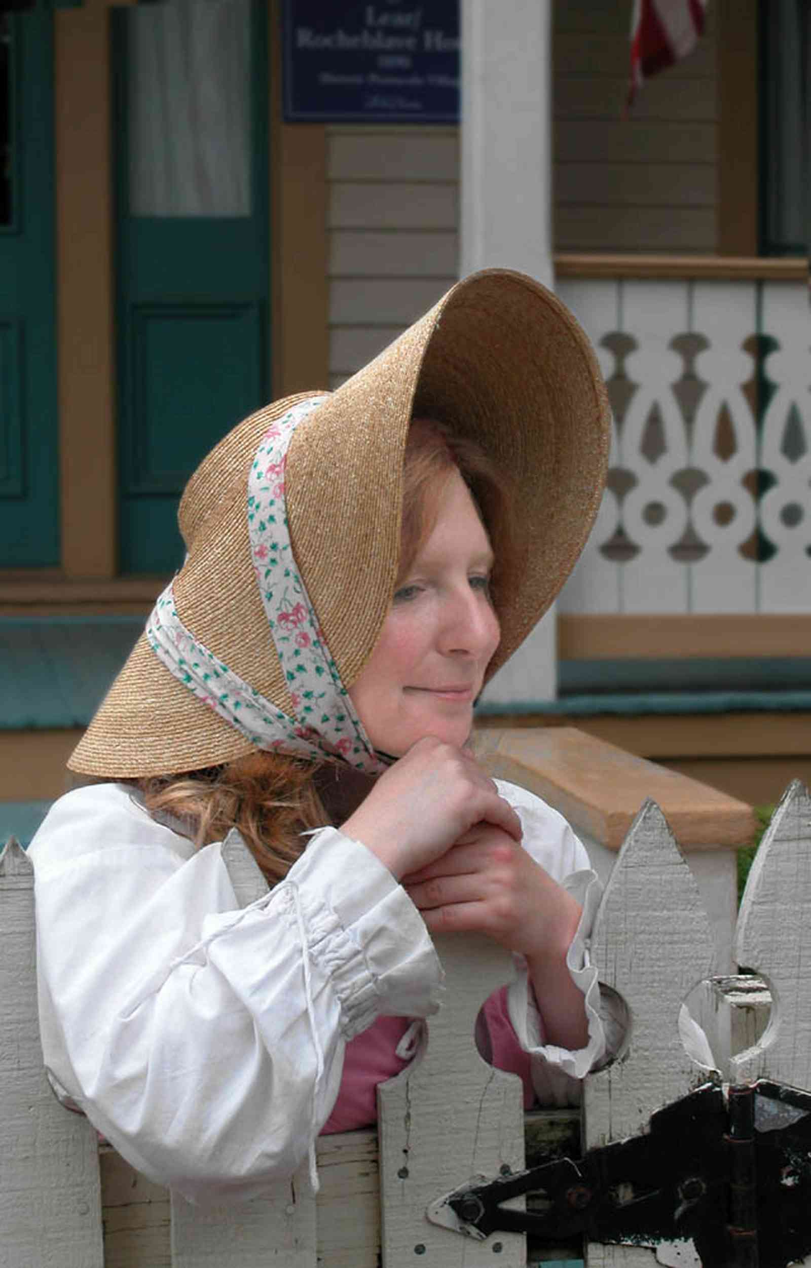 Pensacola:-Historic-Pensacola-Village:-Lear-Rocheblave-House_02b.jpg:  straw hat, garden hat, historic reenactment, dolcent, house tour, guide, picket fence, costume