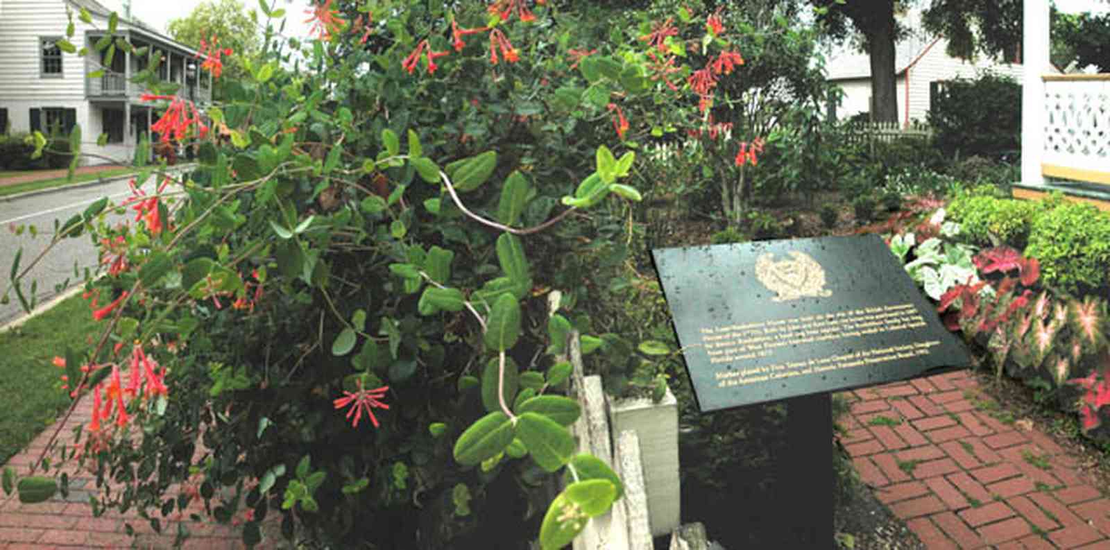 Pensacola:-Historic-Pensacola-Village:-Lear-Rocheblave-House_07c.jpg:  brick sidewalk, front porch, caladiums, lavalle house, museum complex, cottage, historic marker, victorian house