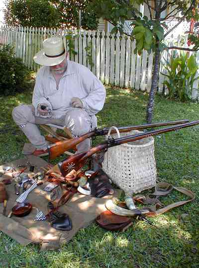 Pensacola:-Historic-Pensacola-Village:-Lear-Rocheblave-House_11.jpg:  historic reenactment, 1812 militiaman, rifle, basket, gunsmith, museum