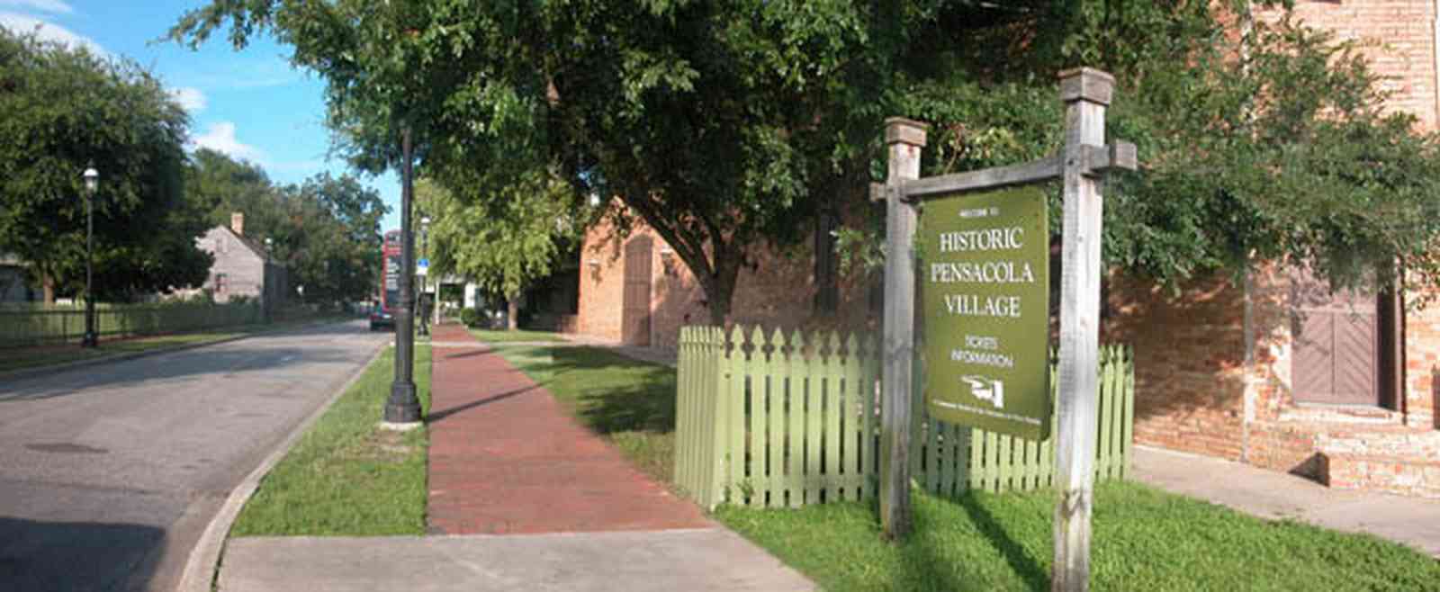 Pensacola:-Historic-Pensacola-Village:-Museum-Of-Commerce_00.jpg:  picket fence, streetscape, victorian village, warehouse building, museum complex