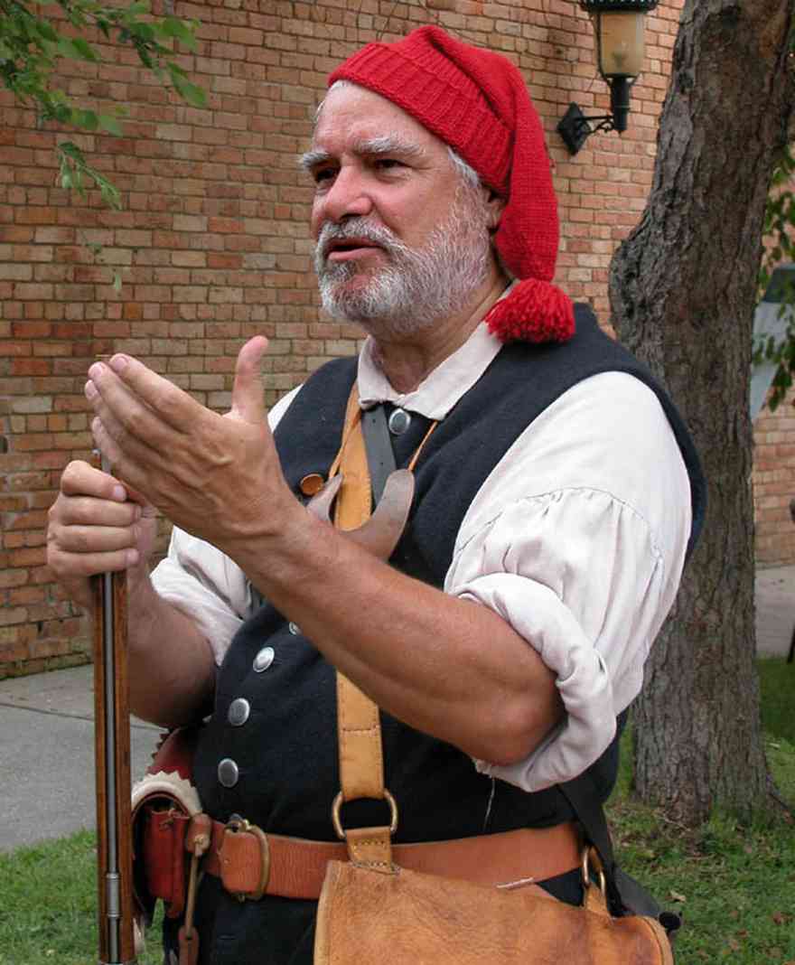 Pensacola:-Historic-Pensacola-Village:-Museum-Of-Commerce_04.jpg:  soldier, red stocking cap, colonial village