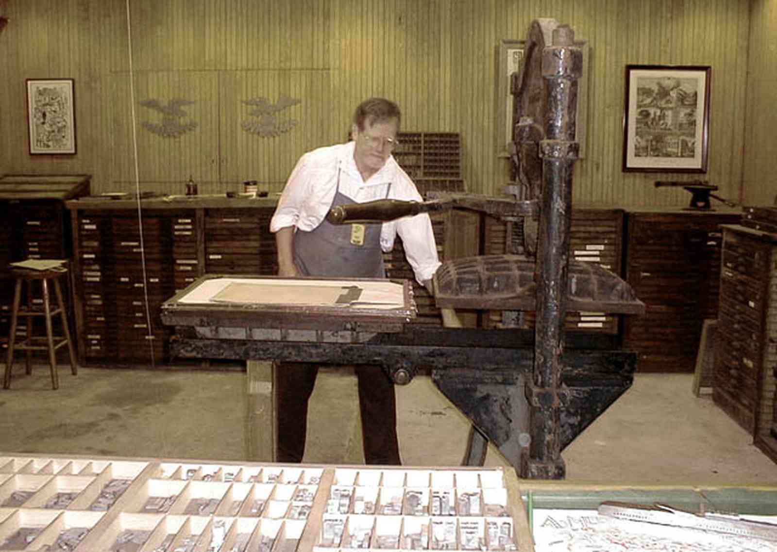 Pensacola:-Historic-Pensacola-Village:-Museum-Of-Commerce_05.jpg:  printer, newspaper printing, linotype, movable type, printing press, museum, historical reenactment, historic village