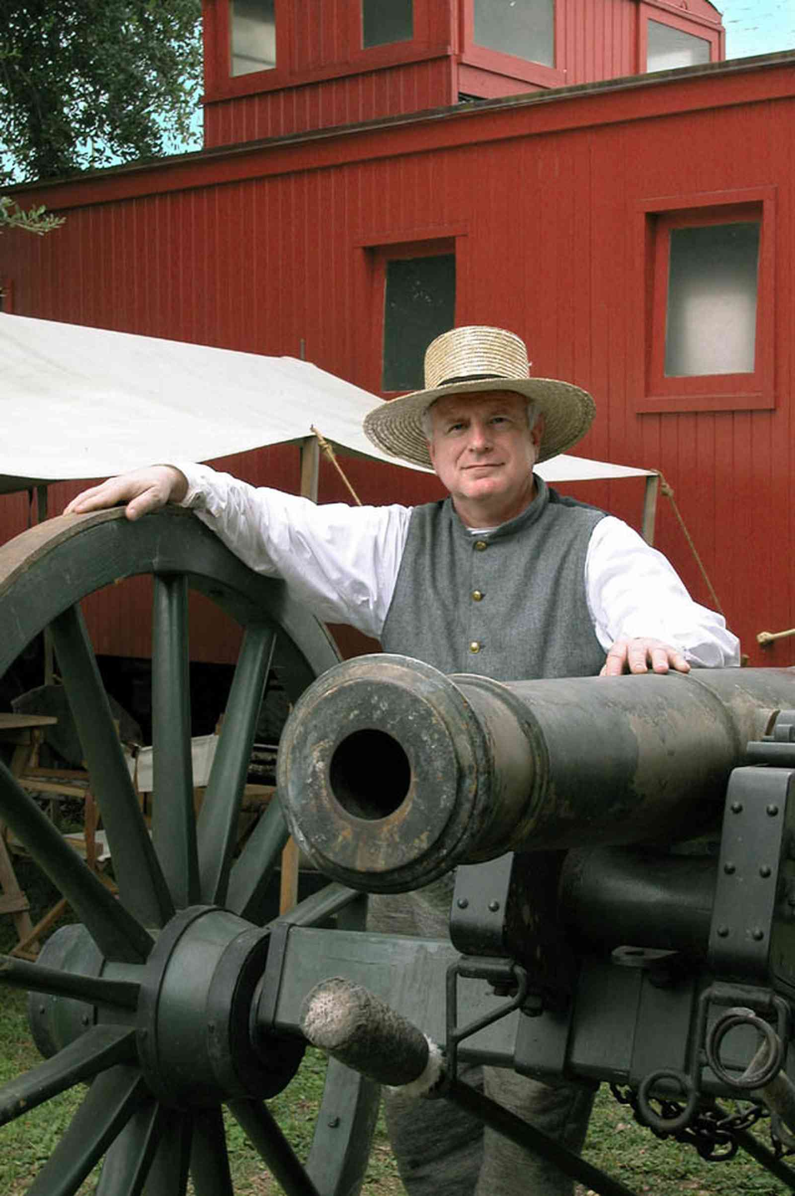 Pensacola:-Historic-Pensacola-Village:-Museum-Of-Industry_01b.jpg:  cannon, historic reenactment, civil war soldier, caboose, train, museum, tent, encampment