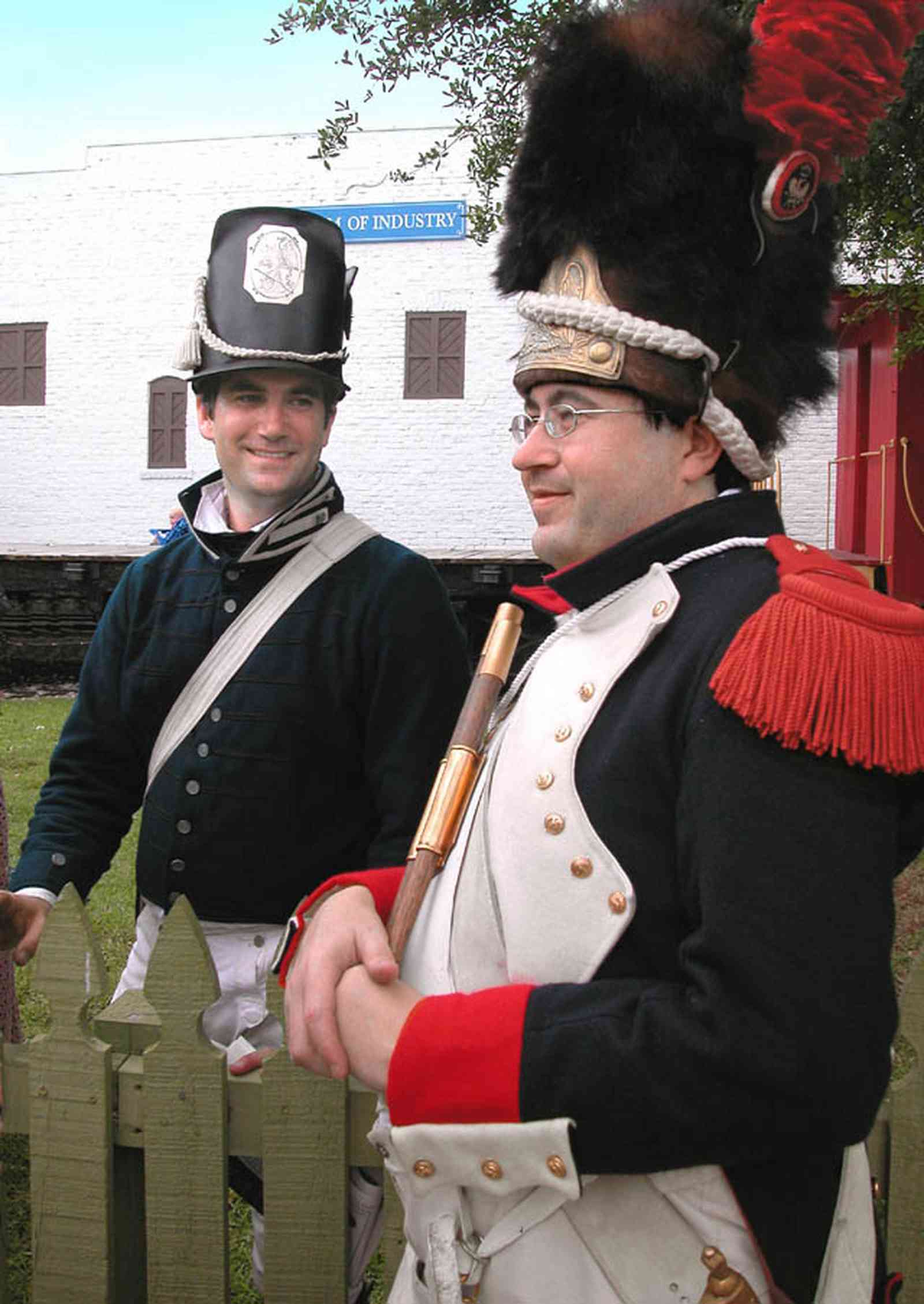 Pensacola:-Historic-Pensacola-Village:-Museum-Of-Industry_01c.jpg:  french battalion, museum, picket fence, soldier, plumned hat, colonial village, 