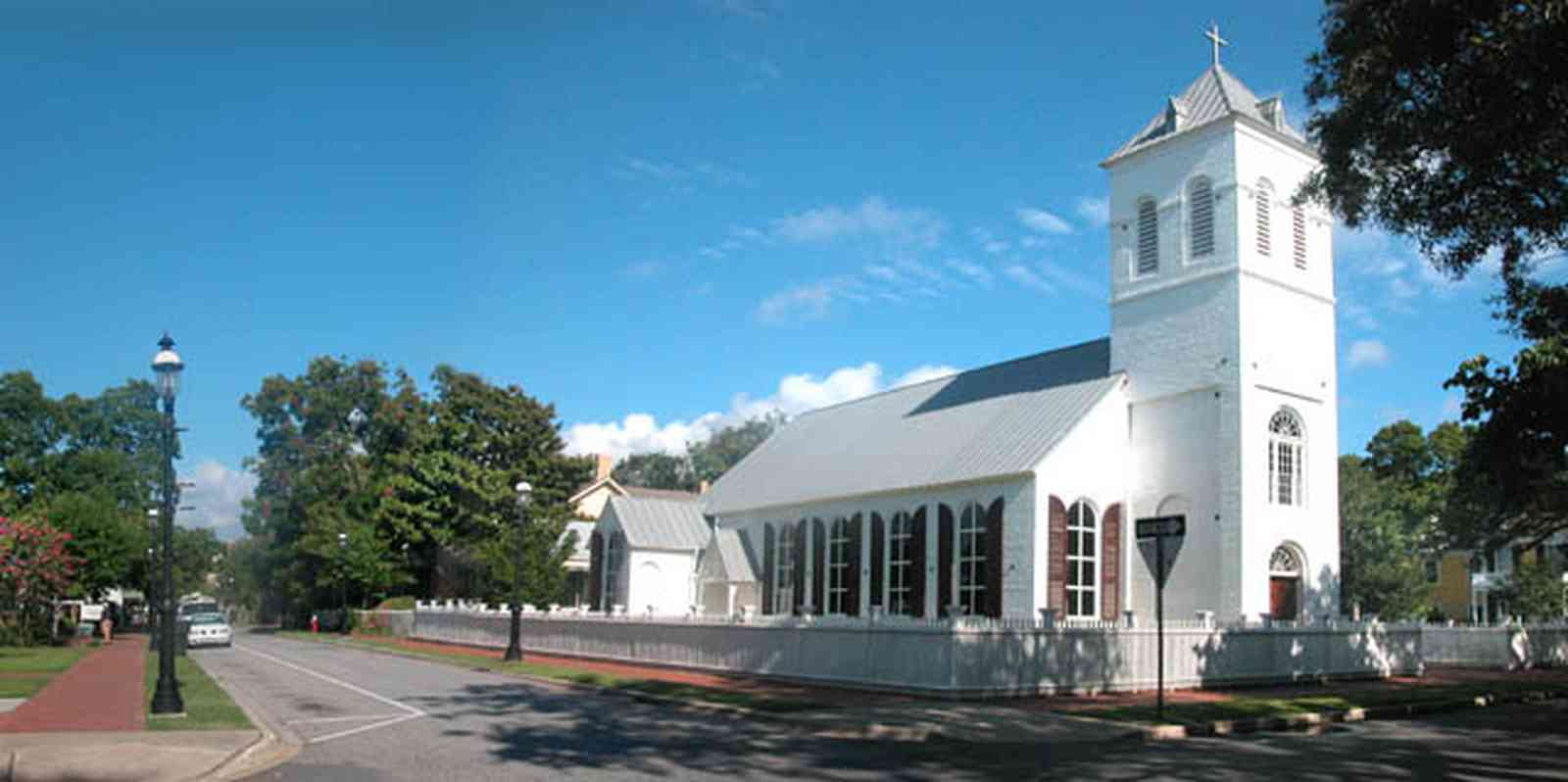 Pensacola:-Historic-Pensacola-Village:-Old-Christ-Church_01a.jpg:  plaque, historic marker, brick structure, religious service, church house, victorian village
