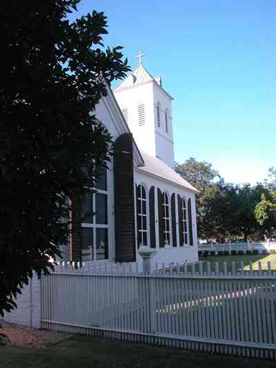 Pensacola:-Historic-Pensacola-Village:-Old-Christ-Church_05.jpg:  plaque, historic marker, brick structure, religious service, church house, victorian village