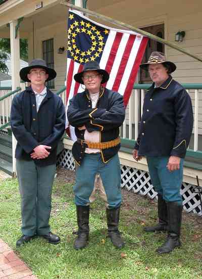 Pensacola:-Historic-Pensacola-Village:-The-Weavers-Cottage_01aa.jpg:  colonial village, historical reenactment, civil war soldiers, brick sidewalk, colonial cottage, gulf coast cottage