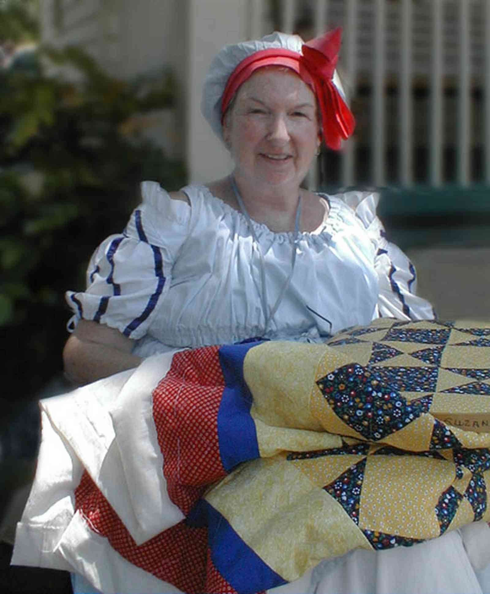 Pensacola:-Historic-Pensacola-Village:-The-Weavers-Cottage_06.jpg:  quilting, reenactor, colonial period, historic reenactment, quilt, weaving, historic village