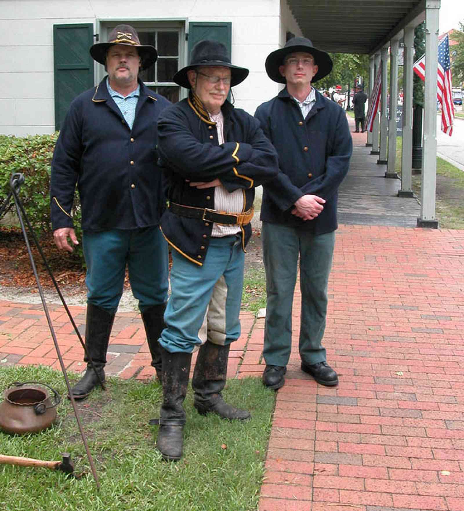 Pensacola:-Historic-Pensacola-Village:-Tivioli-House_00b.jpg:  historical reenactment, civic war soldiers, brick sidewalk, encampment, demonstration