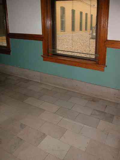 Pensacola:-Palafox-Historic-District:-Blount-Building_04.jpg:  marble floor, casement window, wainscotting