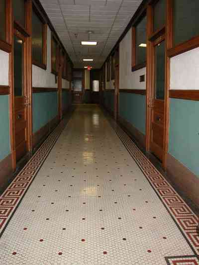 Pensacola:-Palafox-Historic-District:-Blount-Building_06.jpg:  marble floor, casement window, terrazzo tile floor, wainscotting