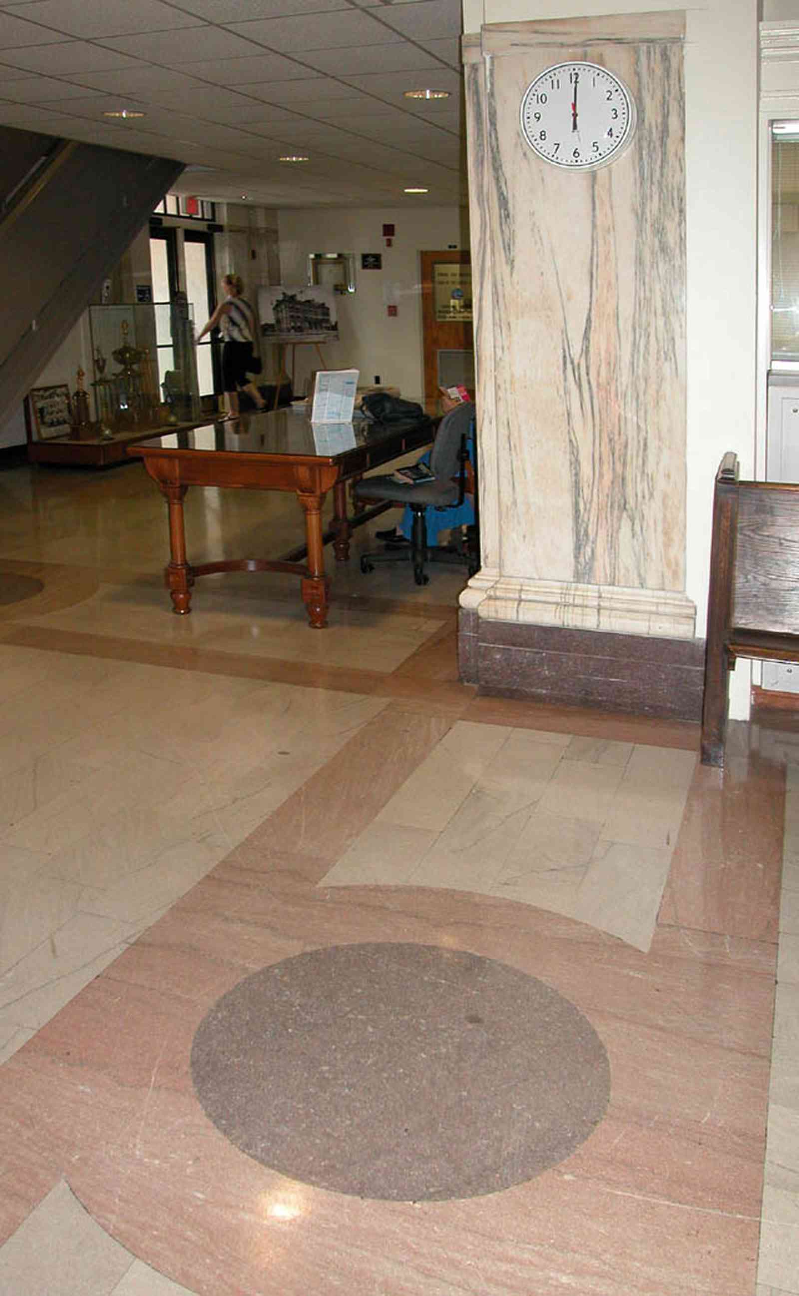 Pensacola:-Palafox-Historic-District:-Escambia-County-Courthouse_05.jpg:  marble floor, marble walls, oak table, foyer, entrance, courthouse, public building
