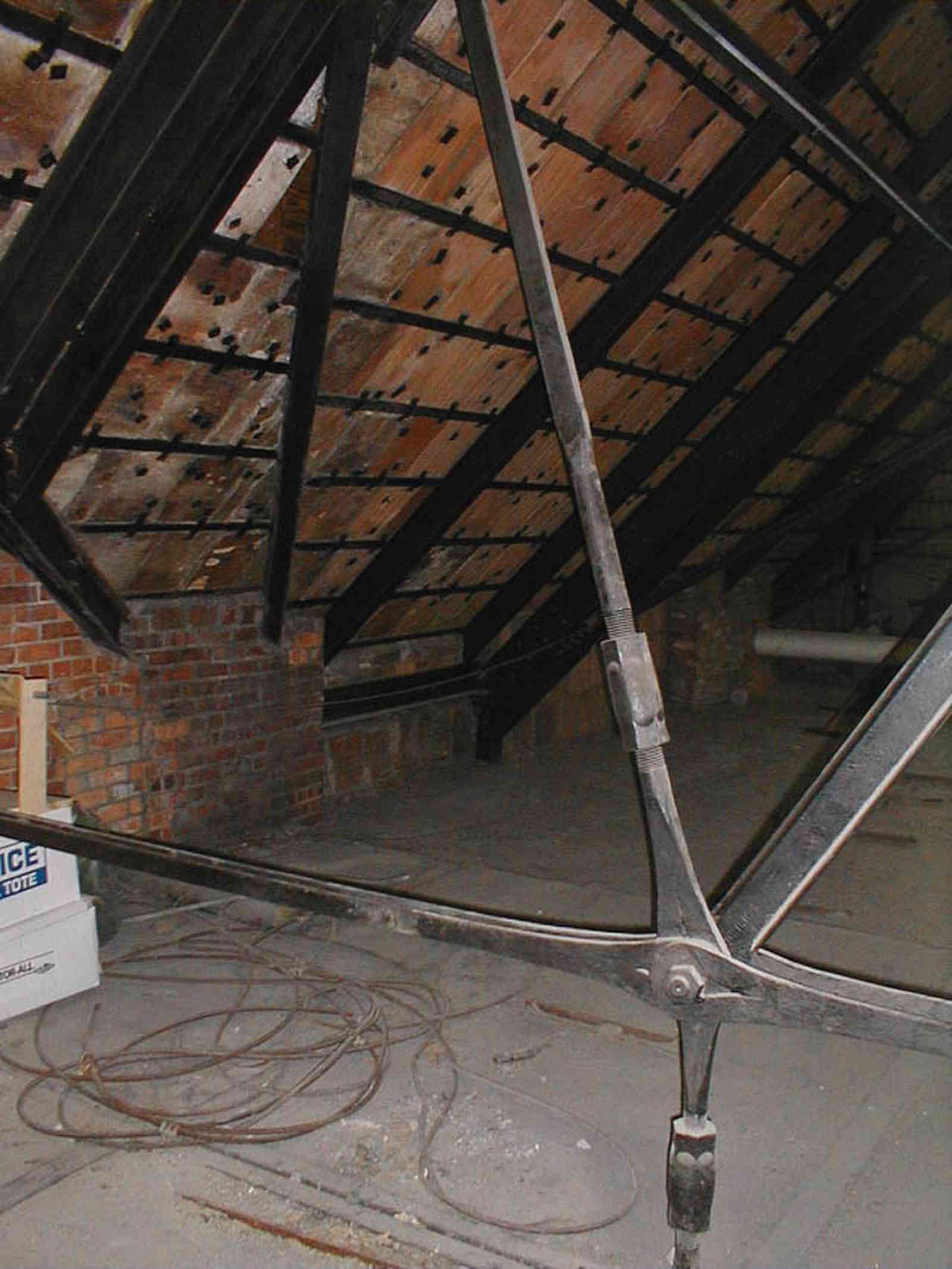 Pensacola:-Palafox-Historic-District:-Escambia-County-Courthouse_11.jpg:  attic, roof tiles, metal spring tension braces, brick walls