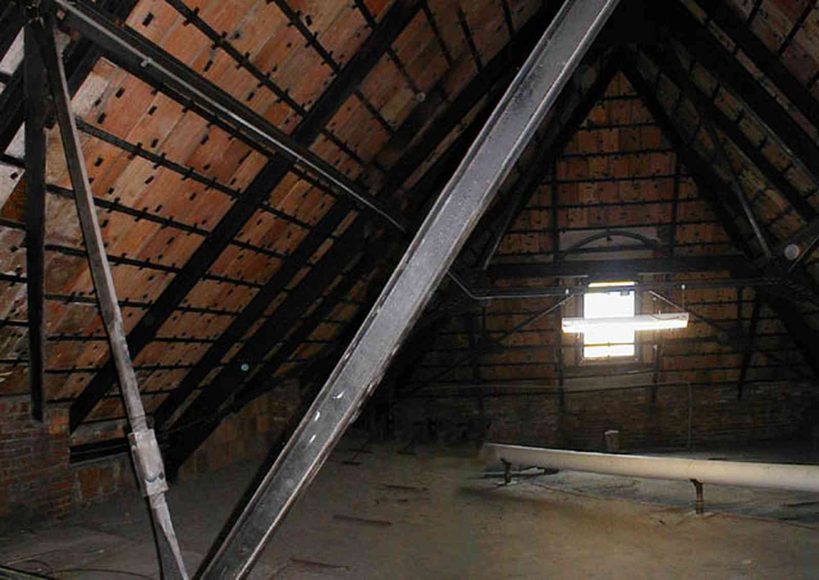Pensacola:-Palafox-Historic-District:-Escambia-County-Courthouse_12.jpg:  attic, roof tiles, metal spring tension braces, brick walls