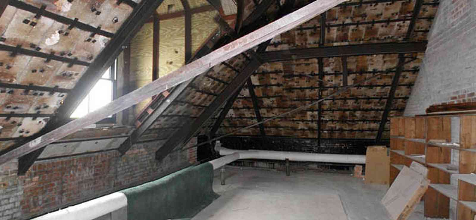 Pensacola:-Palafox-Historic-District:-Escambia-County-Courthouse_14.jpg:  attic, roof tiles, metal spring tension braces, brick walls