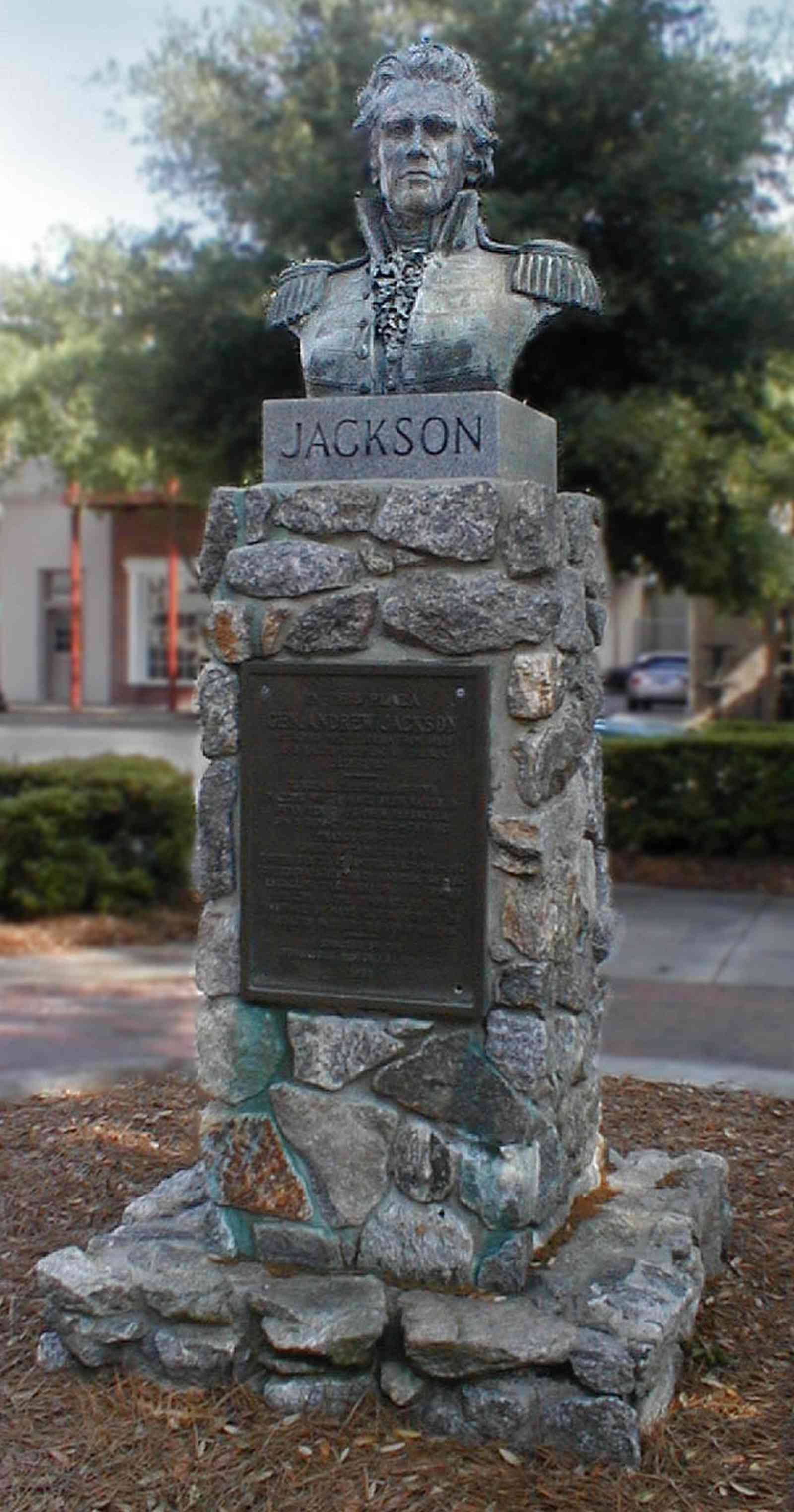 Pensacola:-Palafox-Historic-District:-Ferdinand-Plaza_01a.jpg:  town square, plaza, obelisk, stone wall, oak trees, magnolia trees, historic district, courthouse, jackson's restaurant, empire building