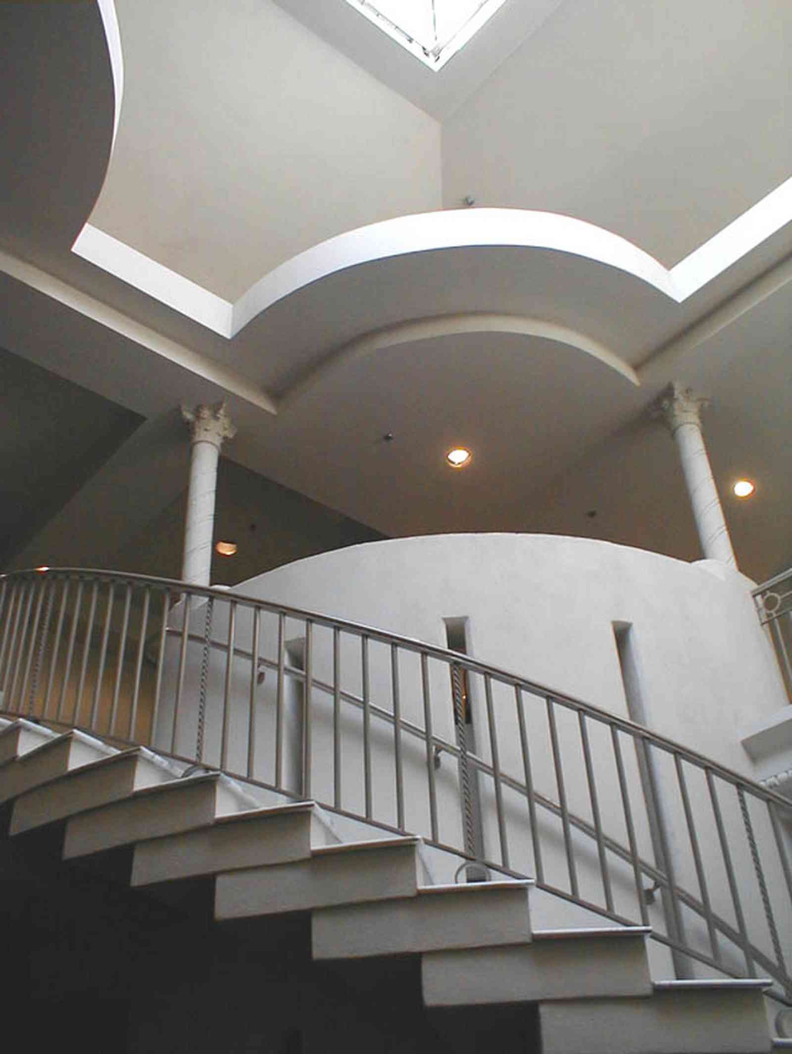 Pensacola:-Palafox-Historic-District:-Saenger-Theatre_04.jpg:  movie theatre, lobby, curving staircase, sky light