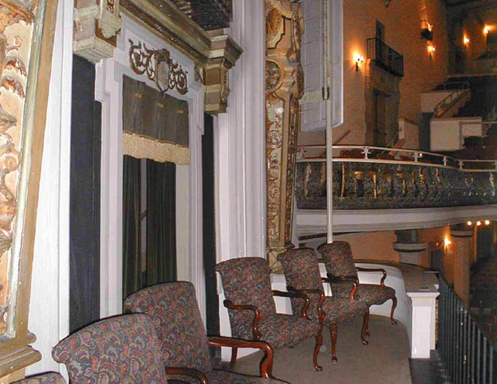 Pensacola:-Palafox-Historic-District:-Saenger-Theatre_10c.jpg:  movie theatre, second floor balcony, box seats, velvet curtains, spanish revival architecture, wrought iron balcony
