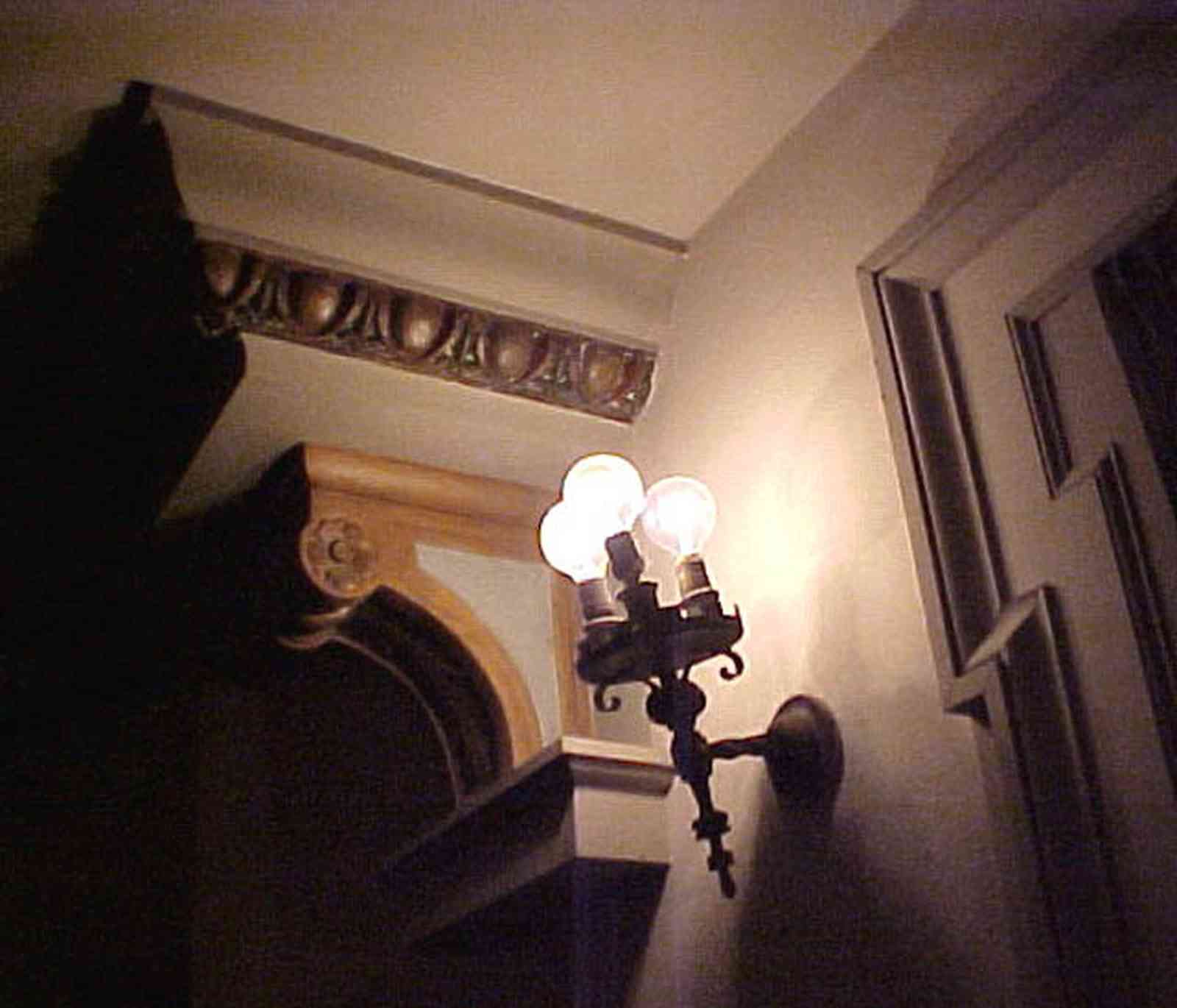 Pensacola:-Palafox-Historic-District:-Saenger-Theatre_11e.jpg:  movie theatre, lamp, bracket, column, spanish revival architecture