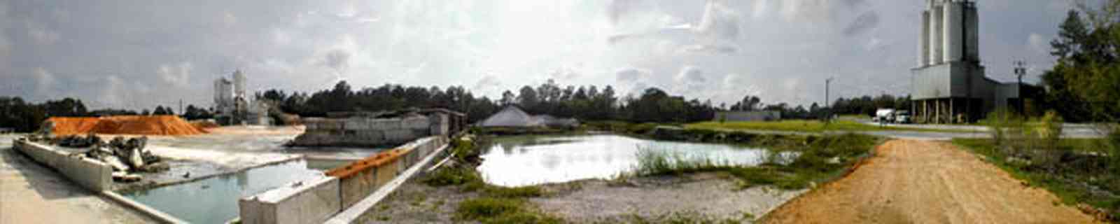 Pensacola:-RMS-Industrial-Plant_01.jpg:  industrial site, train, engine, cement plant