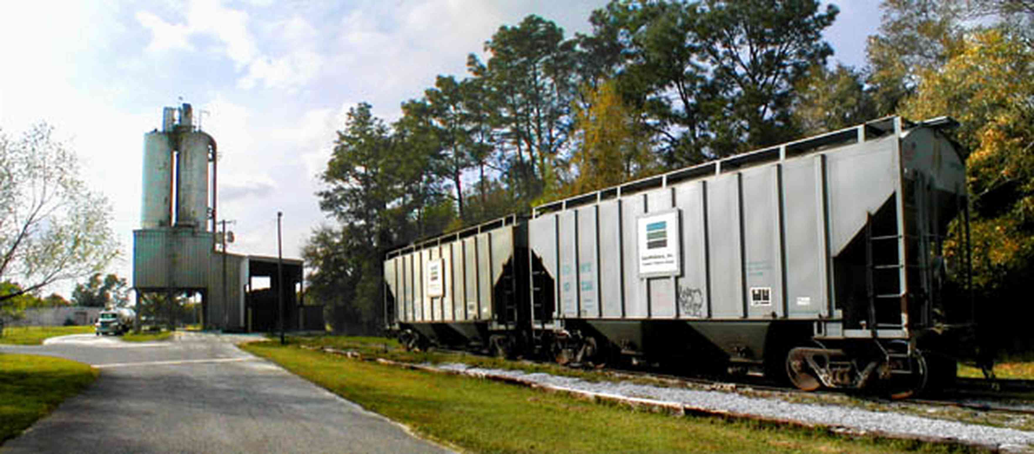 Pensacola:-RMS-Industrial-Plant_02.jpg:  industrial site, train, engine, cement plant